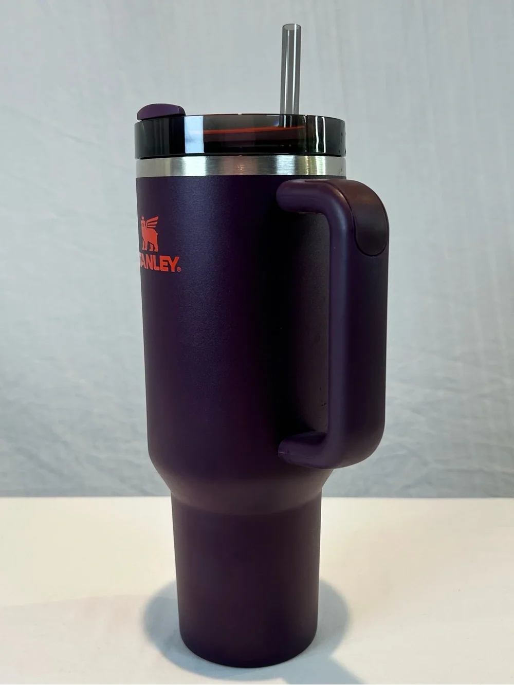 Stanley Plum Purple 40 oz Quencher
H2.0 FlowState Tumbler Mug w Orange logo - Picture 11 of 15